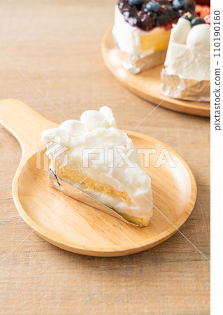 coconut cake on wood plate 110190160