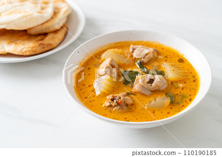 Chicken curry soup with roti Chicken curry soup with roti 110190185