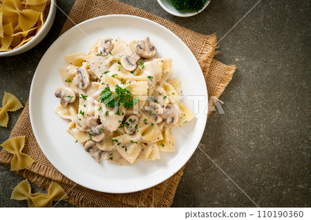 farfalle pasta with mushroom white cream sauce farfalle pasta with mushroom white cream sauce 110190360