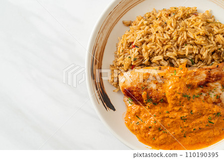 grilled chicken steak with red curry sauce and rice 110190395