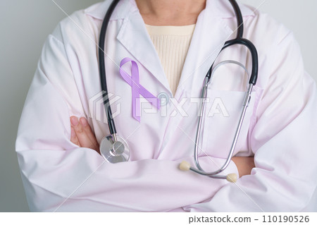 Doctor with purple ribbon for world cancer day, lupus, Pancreatic, Esophageal, Testicular cancer, world Alzheimer, epilepsy, Sarcoidosis, Fibromyalgia and domestic violence Awareness month concepts Doctor with purple ribbon for world cancer day, lupus, Pancreatic, Esophageal, Testicular cancer, world Alzheimer, epilepsy, Sarcoidosis, Fibromyalgia and domestic violence Awareness month concepts 110190526