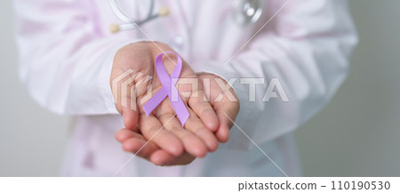 Doctor with purple ribbon for world cancer day, lupus, Pancreatic, Esophageal, Testicular cancer, world Alzheimer, epilepsy, Sarcoidosis, Fibromyalgia and domestic violence Awareness month concepts Doctor with purple ribbon for world cancer day, lupus, Pancreatic, Esophageal, Testicular cancer, world Alzheimer, epilepsy, Sarcoidosis, Fibromyalgia and domestic violence Awareness month concepts 110190530