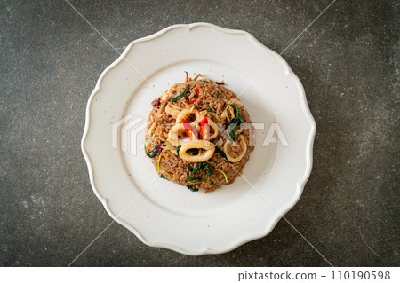 fried rice with squid and basil in Thai style fried rice with squid and basil in Thai style 110190598