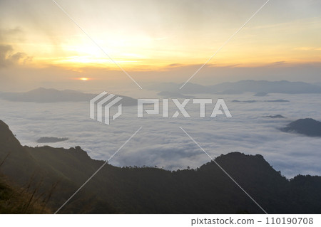 Top view Landscape of Morning Mist with Mountain Layer at north of Thailand. mountain ridge and clouds in rural jungle bush forest 110190708