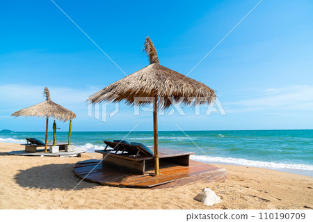 beach chair and umbrella with sea beach background beach chair and umbrella with sea beach background 110190709
