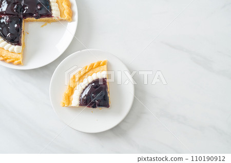 Blueberry Cheese Pie on white plate 110190912