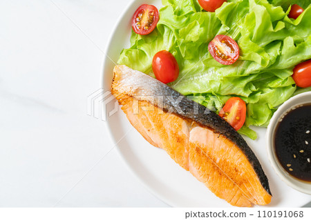 grilled salmon fillet steak with salad grilled salmon fillet steak with salad 110191068