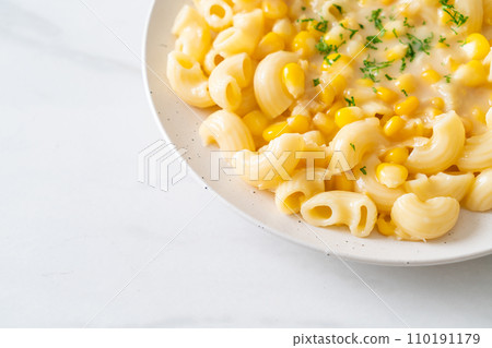 macaroni creamy corn cheese on plate 110191179