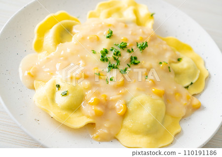ravioli pasta with corn cheese sauce 110191186