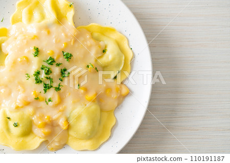 ravioli pasta with corn cheese sauce 110191187