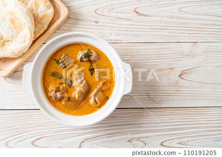 Chicken curry soup with roti Chicken curry soup with roti 110191205