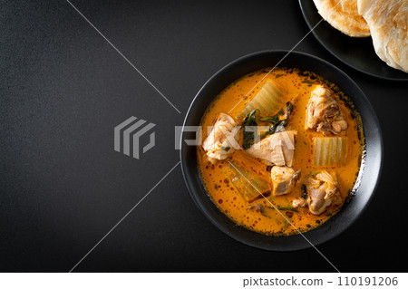 Chicken curry soup with roti 110191206