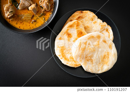 Chicken curry soup with roti Chicken curry soup with roti 110191207
