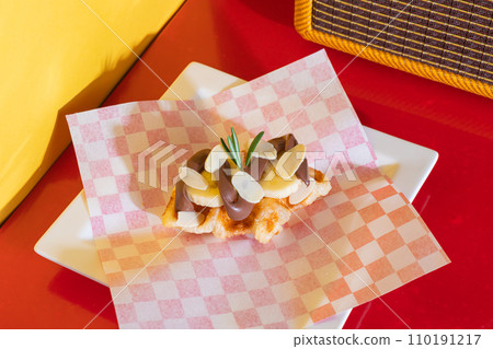 banana nutella croffle - chocolate Nutella with banana on croffle topped with almonds banana nutella croffle - chocolate Nutella with banana on croffle topped with almonds 110191217