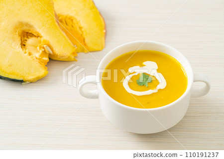 pumpkin soup in white bowl pumpkin soup in white bowl 110191237