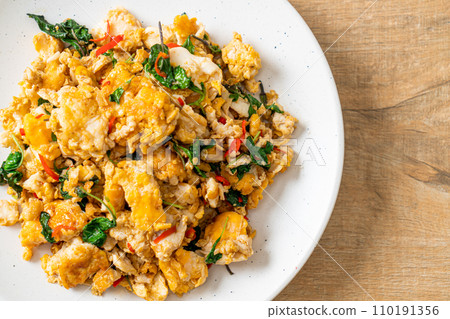 stir-fried egg with Thai basil and chilli stir-fried egg with Thai basil and chilli 110191356