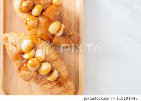 croissant with macadamia and caramel croissant with macadamia and caramel 110191446