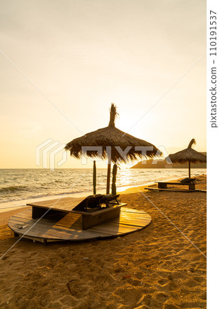 beach chair and umbrella with sea beach background 110191537