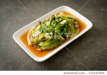 Stir fried Iceberg lettuce with Oyster sauce Stir fried Iceberg lettuce with Oyster sauce 110191844
