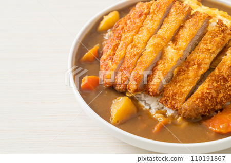 curry rice with fried pork cutlet and creamy omelet curry rice with fried pork cutlet and creamy omelet 110191867