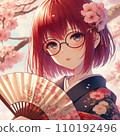 穿著紅色和服的女子站在櫻花前 110192496