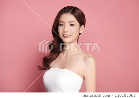 Beautiful young asian woman with clean fresh skin on pink background, Face care, Facial treatment, Cosmetology, beauty and spa, Asian women portrait. 110193368