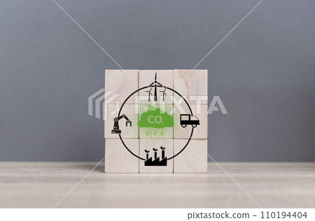 carbon neutral concept. Net zero greenhouse gas emissions target. wooden cubes with icon decrease carbon emission icon on the table. net zero emissions. Sustainable nature in the future. carbon neutral concept. Net zero greenhouse gas emissions target. wooden cubes with icon decrease carbon emission icon on the table. net zero emissions. Sustainable nature in the future. 110194404