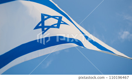 Israel national flag waving on sky background  110196467