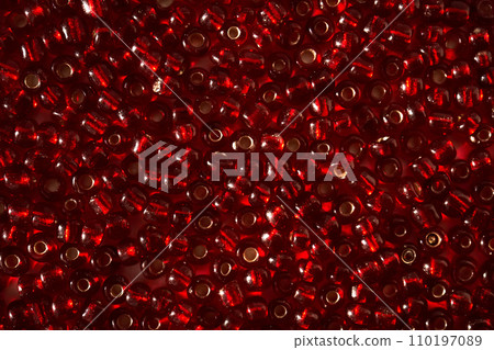 Abstract background from red beads close-up. 110197089