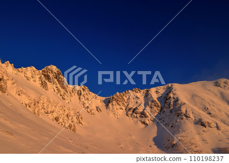 Central Alps in winter: Mt. Hokendake and Morgenrot of Senjojiki Cirque Central Alps in winter: Mt. Hokendake and Morgenrot of Senjojiki Cirque 110198237