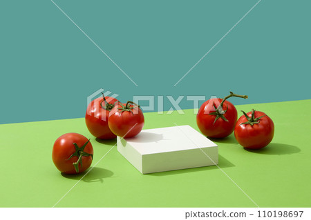 Blank podium in square shaped displayed with several tomatoes. Product presentation, mockup, show cosmetic product, Podium, stage pedestal or platform Blank podium in square shaped displayed with several tomatoes. Product presentation, mockup, show cosmetic product, Podium, stage pedestal or platform 110198697