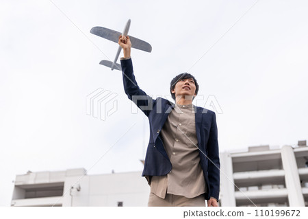 Airplane and man's potole 110199672