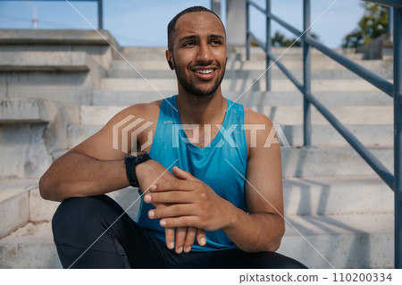 Handsome man in sportswear feeling good and looking confident Handsome man in sportswear feeling good and looking confident 110200334