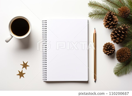 Festive winter background with notebook and cup of 110200687