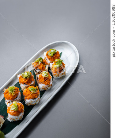 japanese sushi food. Maki ands rolls with tuna, salmon, shrimp, crab and avocado. Rainbow sushi roll, uramaki, hosomaki and nigiri.  110200988