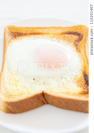 Delicious fried egg on toast Delicious fried egg on toast 110201407