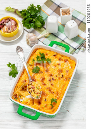 cheesy smoked sausage grits bake in ceramic dish cheesy smoked sausage grits bake in ceramic dish 110201988