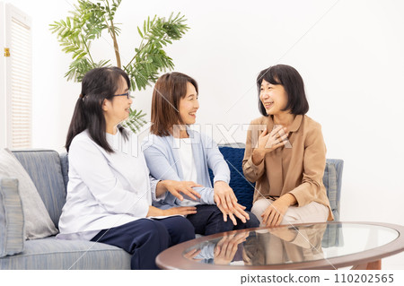 A woman chatting A woman chatting 110202565