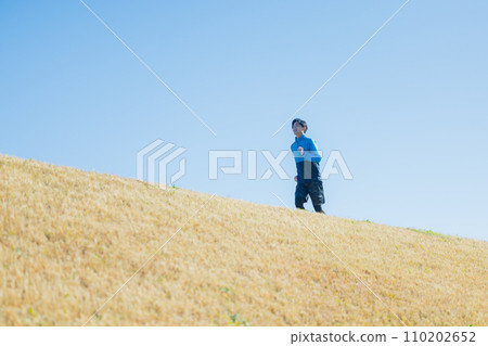A man running on the riverbed 110202652