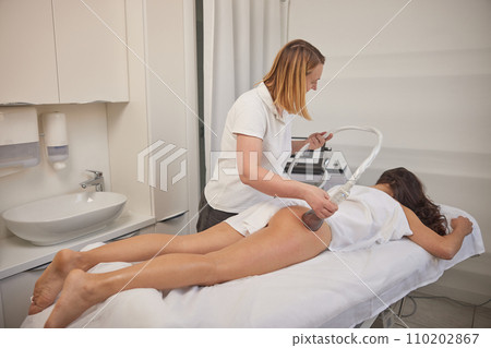 LPG massage, Anti-cellulite, roller-vacuum. Massage of body with vacuum, problem areas slimming using professional equipment, lpg massage procedure, anti-cellulite roller-vacuum massages medicine LPG massage, Anti-cellulite, roller-vacuum. Massage of body with vacuum, problem areas slimming using professional equipment, lpg massage procedure, anti-cellulite roller-vacuum massages medicine 110202867