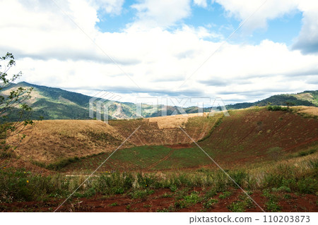 Extinct volcano with fertile land for cultivation in Vietnam. 110203873