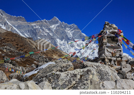 Grave marker facing the south wall of Lhotse with the names of climbers engraved on it 110204211