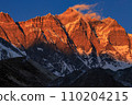 The large rock wall of Lhotse bathed in the setting sun 110204215