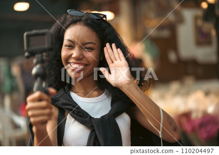 Asian woman enjoy travel in downtown district Asian woman enjoy travel in downtown district 110204497