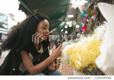 Asian woman enjoy travel in downtown district Asian woman enjoy travel in downtown district 110204498