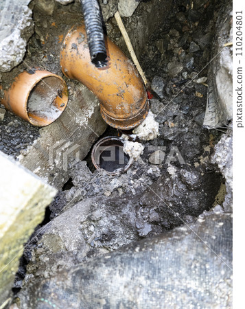 Broken pipes due to subsidence of building on a peatbog Broken pipes due to subsidence of building on a peatbog 110204801