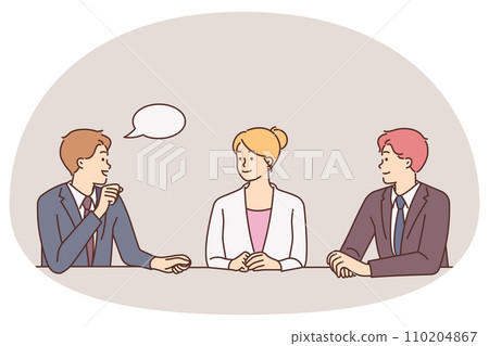 Businesspeople talk at meeting in office 110204867