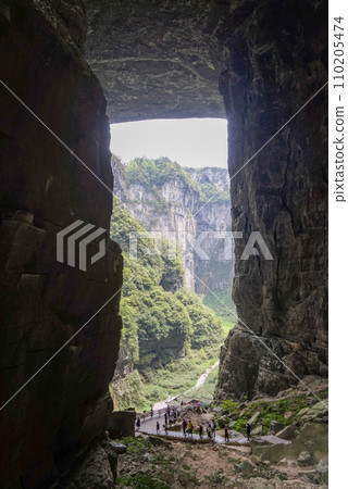 Natural holes created by a combination of time and weathering. 110205474