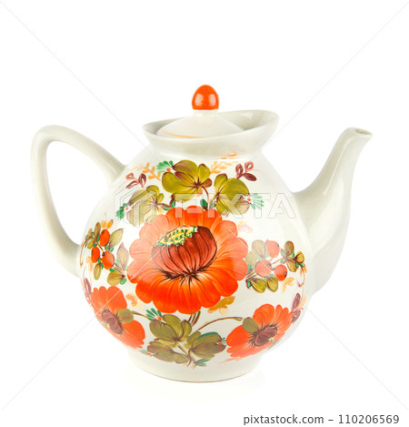 A big porcelain teapot with a bright ornament isolated on a white . 110206569