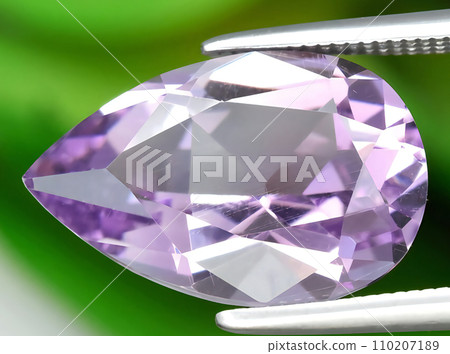 natural purple amethyst gem on the background 110207189